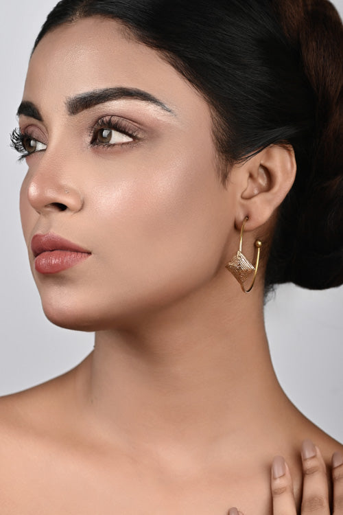 women wearing dangler earring